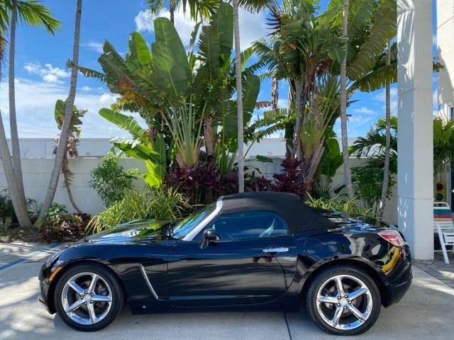 2009 Black Onyx /Black Saturn Sky Red Line TURBO LOW MILES 56,207 (1G8MT35X09Y) with an Turbocharged And Intercooled Ecotec 2.0L VVT DOHC 4-Cyl Aluminum Engine engine, Automatic transmission, located at 4701 North Dixie Hwy, Pompano Beach, FL, 33064, (954) 422-2889, 26.240938, -80.123474 - OUR WEBPAGE FLORIDACARS1.COM HAS OVER 100 PHOTOS AND FREE CARFAX LINK 2009 Saturn SKY Red Line Convertible 2.0L I4 F DOHC 16V Gasoline 31 MPG Rear Wheel Drive Features ABS Brakes Air Conditioning Alloy Wheels AM/FM Stereo Automatic Transmission CD Audio Leather Seats Cruise Control Power Locks Power- Photo#36