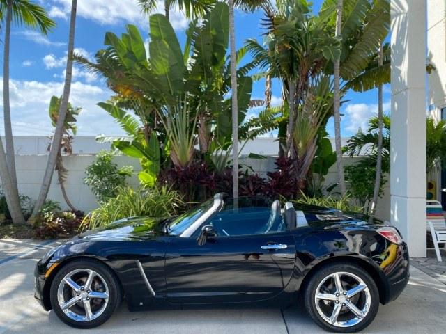 2009 Black Onyx /Black Saturn Sky Red Line TURBO LOW MILES 56,207 (1G8MT35X09Y) with an Turbocharged And Intercooled Ecotec 2.0L VVT DOHC 4-Cyl Aluminum Engine engine, Automatic transmission, located at 4701 North Dixie Hwy, Pompano Beach, FL, 33064, (954) 422-2889, 26.240938, -80.123474 - OUR WEBPAGE FLORIDACARS1.COM HAS OVER 100 PHOTOS AND FREE CARFAX LINK 2009 Saturn SKY Red Line Convertible 2.0L I4 F DOHC 16V Gasoline 31 MPG Rear Wheel Drive Features ABS Brakes Air Conditioning Alloy Wheels AM/FM Stereo Automatic Transmission CD Audio Leather Seats Cruise Control Power Locks Power- Photo#37