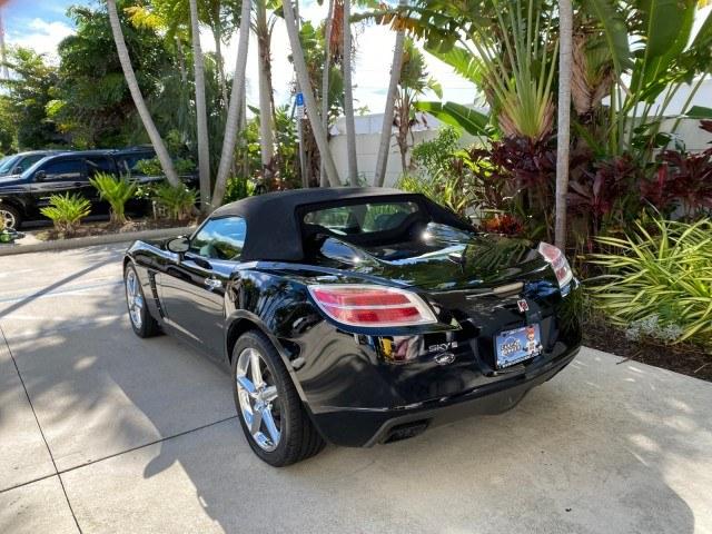 2009 Black Onyx /Black Saturn Sky Red Line TURBO LOW MILES 56,207 (1G8MT35X09Y) with an Turbocharged And Intercooled Ecotec 2.0L VVT DOHC 4-Cyl Aluminum Engine engine, Automatic transmission, located at 4701 North Dixie Hwy, Pompano Beach, FL, 33064, (954) 422-2889, 26.240938, -80.123474 - OUR WEBPAGE FLORIDACARS1.COM HAS OVER 100 PHOTOS AND FREE CARFAX LINK 2009 Saturn SKY Red Line Convertible 2.0L I4 F DOHC 16V Gasoline 31 MPG Rear Wheel Drive Features ABS Brakes Air Conditioning Alloy Wheels AM/FM Stereo Automatic Transmission CD Audio Leather Seats Cruise Control Power Locks Power- Photo#38
