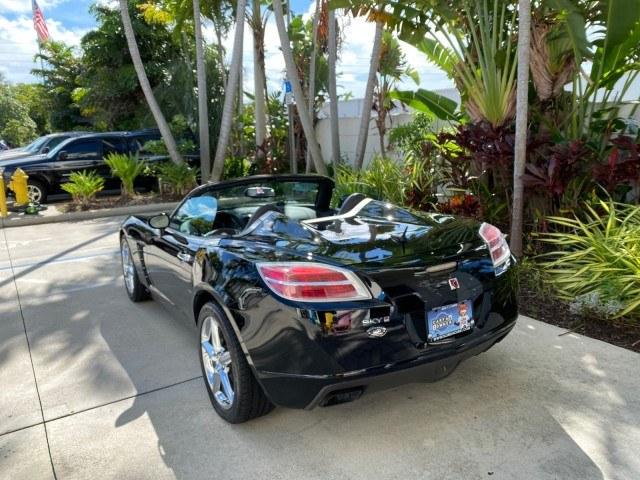 2009 Black Onyx /Black Saturn Sky Red Line TURBO LOW MILES 56,207 (1G8MT35X09Y) with an Turbocharged And Intercooled Ecotec 2.0L VVT DOHC 4-Cyl Aluminum Engine engine, Automatic transmission, located at 4701 North Dixie Hwy, Pompano Beach, FL, 33064, (954) 422-2889, 26.240938, -80.123474 - OUR WEBPAGE FLORIDACARS1.COM HAS OVER 100 PHOTOS AND FREE CARFAX LINK 2009 Saturn SKY Red Line Convertible 2.0L I4 F DOHC 16V Gasoline 31 MPG Rear Wheel Drive Features ABS Brakes Air Conditioning Alloy Wheels AM/FM Stereo Automatic Transmission CD Audio Leather Seats Cruise Control Power Locks Power- Photo#39