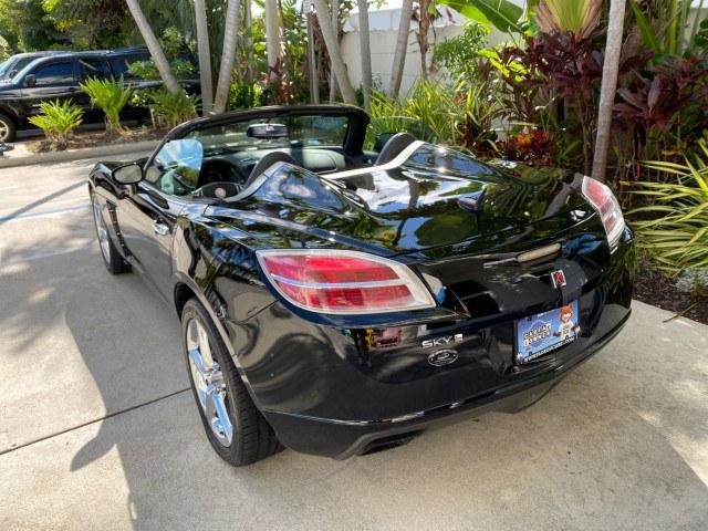 2009 Black Onyx /Black Saturn Sky Red Line TURBO LOW MILES 56,207 (1G8MT35X09Y) with an Turbocharged And Intercooled Ecotec 2.0L VVT DOHC 4-Cyl Aluminum Engine engine, Automatic transmission, located at 4701 North Dixie Hwy, Pompano Beach, FL, 33064, (954) 422-2889, 26.240938, -80.123474 - OUR WEBPAGE FLORIDACARS1.COM HAS OVER 100 PHOTOS AND FREE CARFAX LINK 2009 Saturn SKY Red Line Convertible 2.0L I4 F DOHC 16V Gasoline 31 MPG Rear Wheel Drive Features ABS Brakes Air Conditioning Alloy Wheels AM/FM Stereo Automatic Transmission CD Audio Leather Seats Cruise Control Power Locks Power- Photo#41