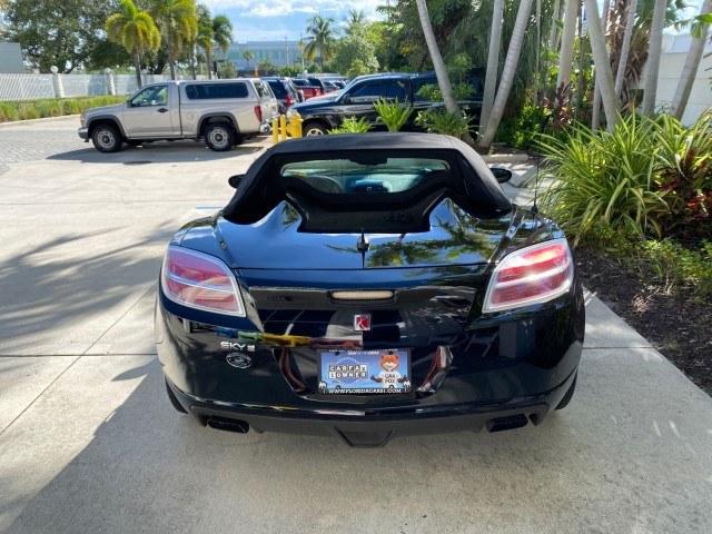 2009 Black Onyx /Black Saturn Sky Red Line TURBO LOW MILES 56,207 (1G8MT35X09Y) with an Turbocharged And Intercooled Ecotec 2.0L VVT DOHC 4-Cyl Aluminum Engine engine, Automatic transmission, located at 4701 North Dixie Hwy, Pompano Beach, FL, 33064, (954) 422-2889, 26.240938, -80.123474 - OUR WEBPAGE FLORIDACARS1.COM HAS OVER 100 PHOTOS AND FREE CARFAX LINK 2009 Saturn SKY Red Line Convertible 2.0L I4 F DOHC 16V Gasoline 31 MPG Rear Wheel Drive Features ABS Brakes Air Conditioning Alloy Wheels AM/FM Stereo Automatic Transmission CD Audio Leather Seats Cruise Control Power Locks Power- Photo#42