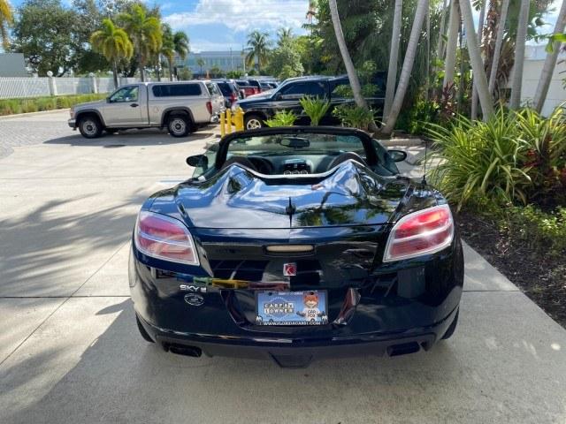 2009 Black Onyx /Black Saturn Sky Red Line TURBO LOW MILES 56,207 (1G8MT35X09Y) with an Turbocharged And Intercooled Ecotec 2.0L VVT DOHC 4-Cyl Aluminum Engine engine, Automatic transmission, located at 4701 North Dixie Hwy, Pompano Beach, FL, 33064, (954) 422-2889, 26.240938, -80.123474 - OUR WEBPAGE FLORIDACARS1.COM HAS OVER 100 PHOTOS AND FREE CARFAX LINK 2009 Saturn SKY Red Line Convertible 2.0L I4 F DOHC 16V Gasoline 31 MPG Rear Wheel Drive Features ABS Brakes Air Conditioning Alloy Wheels AM/FM Stereo Automatic Transmission CD Audio Leather Seats Cruise Control Power Locks Power- Photo#43