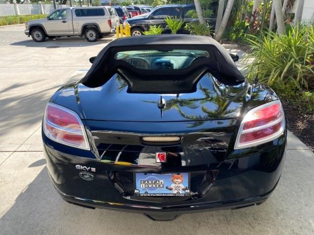2009 Black Onyx /Black Saturn Sky Red Line TURBO LOW MILES 56,207 (1G8MT35X09Y) with an Turbocharged And Intercooled Ecotec 2.0L VVT DOHC 4-Cyl Aluminum Engine engine, Automatic transmission, located at 4701 North Dixie Hwy, Pompano Beach, FL, 33064, (954) 422-2889, 26.240938, -80.123474 - OUR WEBPAGE FLORIDACARS1.COM HAS OVER 100 PHOTOS AND FREE CARFAX LINK 2009 Saturn SKY Red Line Convertible 2.0L I4 F DOHC 16V Gasoline 31 MPG Rear Wheel Drive Features ABS Brakes Air Conditioning Alloy Wheels AM/FM Stereo Automatic Transmission CD Audio Leather Seats Cruise Control Power Locks Power- Photo#44