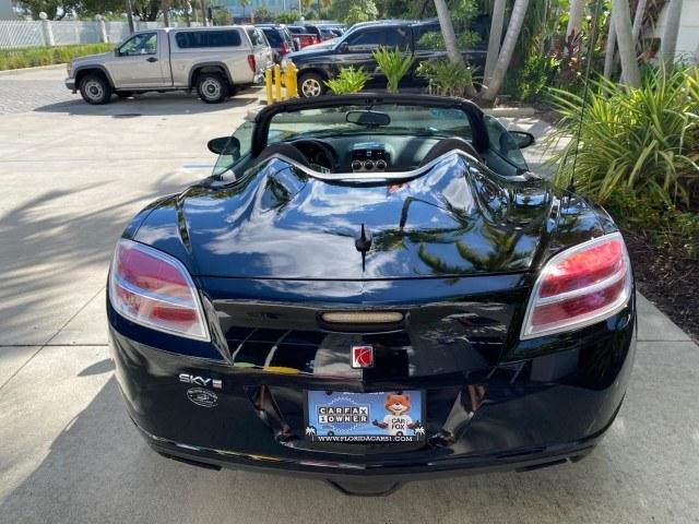 2009 Black Onyx /Black Saturn Sky Red Line TURBO LOW MILES 56,207 (1G8MT35X09Y) with an Turbocharged And Intercooled Ecotec 2.0L VVT DOHC 4-Cyl Aluminum Engine engine, Automatic transmission, located at 4701 North Dixie Hwy, Pompano Beach, FL, 33064, (954) 422-2889, 26.240938, -80.123474 - OUR WEBPAGE FLORIDACARS1.COM HAS OVER 100 PHOTOS AND FREE CARFAX LINK 2009 Saturn SKY Red Line Convertible 2.0L I4 F DOHC 16V Gasoline 31 MPG Rear Wheel Drive Features ABS Brakes Air Conditioning Alloy Wheels AM/FM Stereo Automatic Transmission CD Audio Leather Seats Cruise Control Power Locks Power- Photo#45