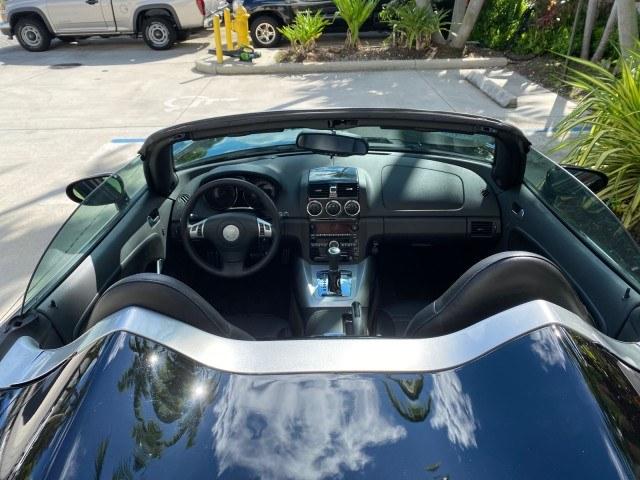 2009 Black Onyx /Black Saturn Sky Red Line TURBO LOW MILES 56,207 (1G8MT35X09Y) with an Turbocharged And Intercooled Ecotec 2.0L VVT DOHC 4-Cyl Aluminum Engine engine, Automatic transmission, located at 4701 North Dixie Hwy, Pompano Beach, FL, 33064, (954) 422-2889, 26.240938, -80.123474 - OUR WEBPAGE FLORIDACARS1.COM HAS OVER 100 PHOTOS AND FREE CARFAX LINK 2009 Saturn SKY Red Line Convertible 2.0L I4 F DOHC 16V Gasoline 31 MPG Rear Wheel Drive Features ABS Brakes Air Conditioning Alloy Wheels AM/FM Stereo Automatic Transmission CD Audio Leather Seats Cruise Control Power Locks Power- Photo#46