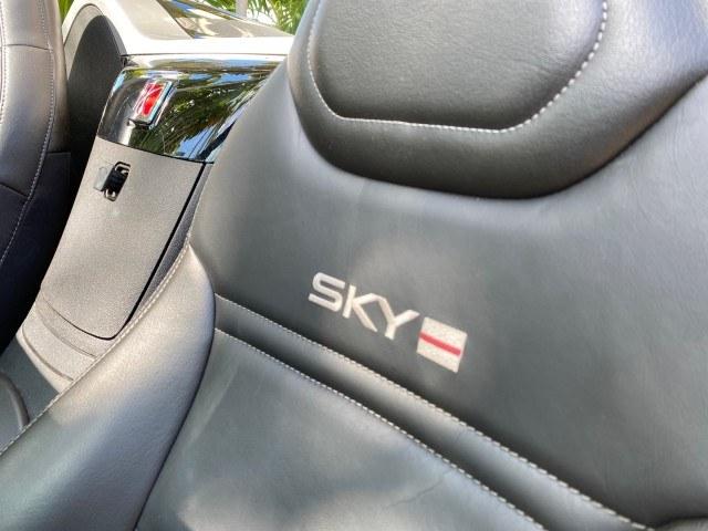 2009 Black Onyx /Black Saturn Sky Red Line TURBO LOW MILES 56,207 (1G8MT35X09Y) with an Turbocharged And Intercooled Ecotec 2.0L VVT DOHC 4-Cyl Aluminum Engine engine, Automatic transmission, located at 4701 North Dixie Hwy, Pompano Beach, FL, 33064, (954) 422-2889, 26.240938, -80.123474 - OUR WEBPAGE FLORIDACARS1.COM HAS OVER 100 PHOTOS AND FREE CARFAX LINK 2009 Saturn SKY Red Line Convertible 2.0L I4 F DOHC 16V Gasoline 31 MPG Rear Wheel Drive Features ABS Brakes Air Conditioning Alloy Wheels AM/FM Stereo Automatic Transmission CD Audio Leather Seats Cruise Control Power Locks Power- Photo#49