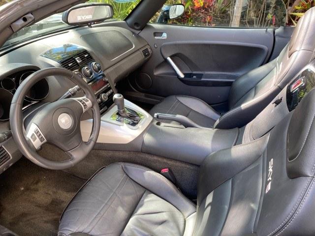 2009 Black Onyx /Black Saturn Sky Red Line TURBO LOW MILES 56,207 (1G8MT35X09Y) with an Turbocharged And Intercooled Ecotec 2.0L VVT DOHC 4-Cyl Aluminum Engine engine, Automatic transmission, located at 4701 North Dixie Hwy, Pompano Beach, FL, 33064, (954) 422-2889, 26.240938, -80.123474 - OUR WEBPAGE FLORIDACARS1.COM HAS OVER 100 PHOTOS AND FREE CARFAX LINK 2009 Saturn SKY Red Line Convertible 2.0L I4 F DOHC 16V Gasoline 31 MPG Rear Wheel Drive Features ABS Brakes Air Conditioning Alloy Wheels AM/FM Stereo Automatic Transmission CD Audio Leather Seats Cruise Control Power Locks Power- Photo#50
