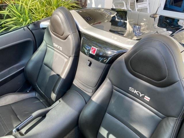 2009 Black Onyx /Black Saturn Sky Red Line TURBO LOW MILES 56,207 (1G8MT35X09Y) with an Turbocharged And Intercooled Ecotec 2.0L VVT DOHC 4-Cyl Aluminum Engine engine, Automatic transmission, located at 4701 North Dixie Hwy, Pompano Beach, FL, 33064, (954) 422-2889, 26.240938, -80.123474 - OUR WEBPAGE FLORIDACARS1.COM HAS OVER 100 PHOTOS AND FREE CARFAX LINK 2009 Saturn SKY Red Line Convertible 2.0L I4 F DOHC 16V Gasoline 31 MPG Rear Wheel Drive Features ABS Brakes Air Conditioning Alloy Wheels AM/FM Stereo Automatic Transmission CD Audio Leather Seats Cruise Control Power Locks Power- Photo#51