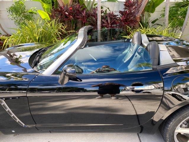 2009 Black Onyx /Black Saturn Sky Red Line TURBO LOW MILES 56,207 (1G8MT35X09Y) with an Turbocharged And Intercooled Ecotec 2.0L VVT DOHC 4-Cyl Aluminum Engine engine, Automatic transmission, located at 4701 North Dixie Hwy, Pompano Beach, FL, 33064, (954) 422-2889, 26.240938, -80.123474 - OUR WEBPAGE FLORIDACARS1.COM HAS OVER 100 PHOTOS AND FREE CARFAX LINK 2009 Saturn SKY Red Line Convertible 2.0L I4 F DOHC 16V Gasoline 31 MPG Rear Wheel Drive Features ABS Brakes Air Conditioning Alloy Wheels AM/FM Stereo Automatic Transmission CD Audio Leather Seats Cruise Control Power Locks Power- Photo#56