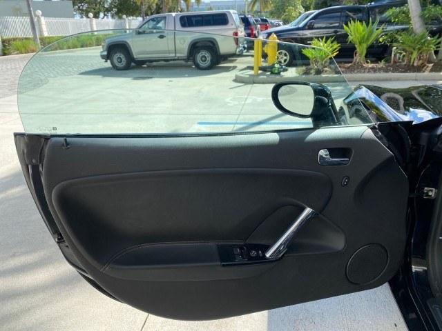 2009 Black Onyx /Black Saturn Sky Red Line TURBO LOW MILES 56,207 (1G8MT35X09Y) with an Turbocharged And Intercooled Ecotec 2.0L VVT DOHC 4-Cyl Aluminum Engine engine, Automatic transmission, located at 4701 North Dixie Hwy, Pompano Beach, FL, 33064, (954) 422-2889, 26.240938, -80.123474 - OUR WEBPAGE FLORIDACARS1.COM HAS OVER 100 PHOTOS AND FREE CARFAX LINK 2009 Saturn SKY Red Line Convertible 2.0L I4 F DOHC 16V Gasoline 31 MPG Rear Wheel Drive Features ABS Brakes Air Conditioning Alloy Wheels AM/FM Stereo Automatic Transmission CD Audio Leather Seats Cruise Control Power Locks Power- Photo#60