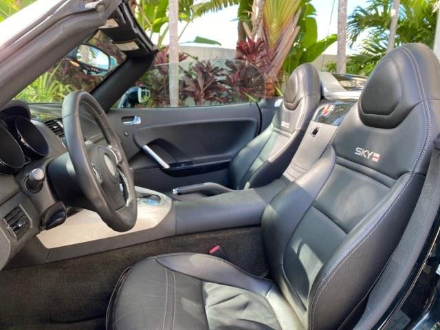 2009 Black Onyx /Black Saturn Sky Red Line TURBO LOW MILES 56,207 (1G8MT35X09Y) with an Turbocharged And Intercooled Ecotec 2.0L VVT DOHC 4-Cyl Aluminum Engine engine, Automatic transmission, located at 4701 North Dixie Hwy, Pompano Beach, FL, 33064, (954) 422-2889, 26.240938, -80.123474 - OUR WEBPAGE FLORIDACARS1.COM HAS OVER 100 PHOTOS AND FREE CARFAX LINK 2009 Saturn SKY Red Line Convertible 2.0L I4 F DOHC 16V Gasoline 31 MPG Rear Wheel Drive Features ABS Brakes Air Conditioning Alloy Wheels AM/FM Stereo Automatic Transmission CD Audio Leather Seats Cruise Control Power Locks Power- Photo#63