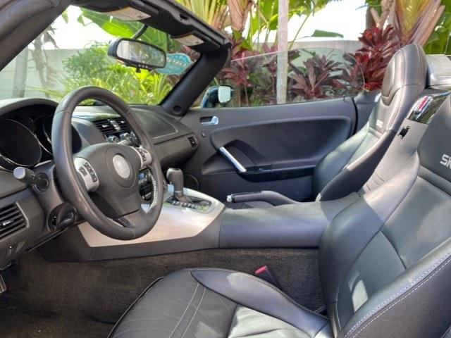 2009 Black Onyx /Black Saturn Sky Red Line TURBO LOW MILES 56,207 (1G8MT35X09Y) with an Turbocharged And Intercooled Ecotec 2.0L VVT DOHC 4-Cyl Aluminum Engine engine, Automatic transmission, located at 4701 North Dixie Hwy, Pompano Beach, FL, 33064, (954) 422-2889, 26.240938, -80.123474 - OUR WEBPAGE FLORIDACARS1.COM HAS OVER 100 PHOTOS AND FREE CARFAX LINK 2009 Saturn SKY Red Line Convertible 2.0L I4 F DOHC 16V Gasoline 31 MPG Rear Wheel Drive Features ABS Brakes Air Conditioning Alloy Wheels AM/FM Stereo Automatic Transmission CD Audio Leather Seats Cruise Control Power Locks Power- Photo#65