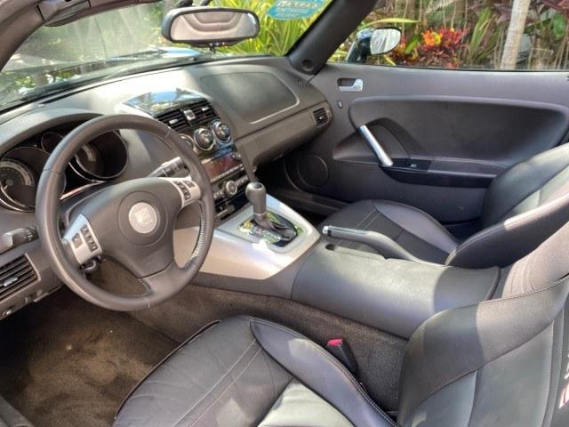 2009 Black Onyx /Black Saturn Sky Red Line TURBO LOW MILES 56,207 (1G8MT35X09Y) with an Turbocharged And Intercooled Ecotec 2.0L VVT DOHC 4-Cyl Aluminum Engine engine, Automatic transmission, located at 4701 North Dixie Hwy, Pompano Beach, FL, 33064, (954) 422-2889, 26.240938, -80.123474 - OUR WEBPAGE FLORIDACARS1.COM HAS OVER 100 PHOTOS AND FREE CARFAX LINK 2009 Saturn SKY Red Line Convertible 2.0L I4 F DOHC 16V Gasoline 31 MPG Rear Wheel Drive Features ABS Brakes Air Conditioning Alloy Wheels AM/FM Stereo Automatic Transmission CD Audio Leather Seats Cruise Control Power Locks Power- Photo#66