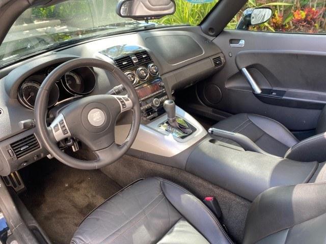 2009 Black Onyx /Black Saturn Sky Red Line TURBO LOW MILES 56,207 (1G8MT35X09Y) with an Turbocharged And Intercooled Ecotec 2.0L VVT DOHC 4-Cyl Aluminum Engine engine, Automatic transmission, located at 4701 North Dixie Hwy, Pompano Beach, FL, 33064, (954) 422-2889, 26.240938, -80.123474 - OUR WEBPAGE FLORIDACARS1.COM HAS OVER 100 PHOTOS AND FREE CARFAX LINK 2009 Saturn SKY Red Line Convertible 2.0L I4 F DOHC 16V Gasoline 31 MPG Rear Wheel Drive Features ABS Brakes Air Conditioning Alloy Wheels AM/FM Stereo Automatic Transmission CD Audio Leather Seats Cruise Control Power Locks Power- Photo#67