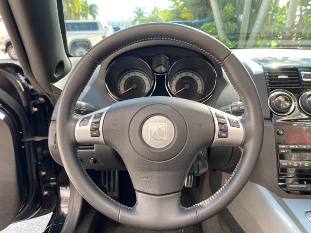 2009 Black Onyx /Black Saturn Sky Red Line TURBO LOW MILES 56,207 (1G8MT35X09Y) with an Turbocharged And Intercooled Ecotec 2.0L VVT DOHC 4-Cyl Aluminum Engine engine, Automatic transmission, located at 4701 North Dixie Hwy, Pompano Beach, FL, 33064, (954) 422-2889, 26.240938, -80.123474 - OUR WEBPAGE FLORIDACARS1.COM HAS OVER 100 PHOTOS AND FREE CARFAX LINK 2009 Saturn SKY Red Line Convertible 2.0L I4 F DOHC 16V Gasoline 31 MPG Rear Wheel Drive Features ABS Brakes Air Conditioning Alloy Wheels AM/FM Stereo Automatic Transmission CD Audio Leather Seats Cruise Control Power Locks Power- Photo#69