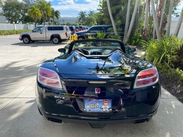 2009 Black Onyx /Black Saturn Sky Red Line TURBO LOW MILES 56,207 (1G8MT35X09Y) with an Turbocharged And Intercooled Ecotec 2.0L VVT DOHC 4-Cyl Aluminum Engine engine, Automatic transmission, located at 4701 North Dixie Hwy, Pompano Beach, FL, 33064, (954) 422-2889, 26.240938, -80.123474 - OUR WEBPAGE FLORIDACARS1.COM HAS OVER 100 PHOTOS AND FREE CARFAX LINK 2009 Saturn SKY Red Line Convertible 2.0L I4 F DOHC 16V Gasoline 31 MPG Rear Wheel Drive Features ABS Brakes Air Conditioning Alloy Wheels AM/FM Stereo Automatic Transmission CD Audio Leather Seats Cruise Control Power Locks Power- Photo#90