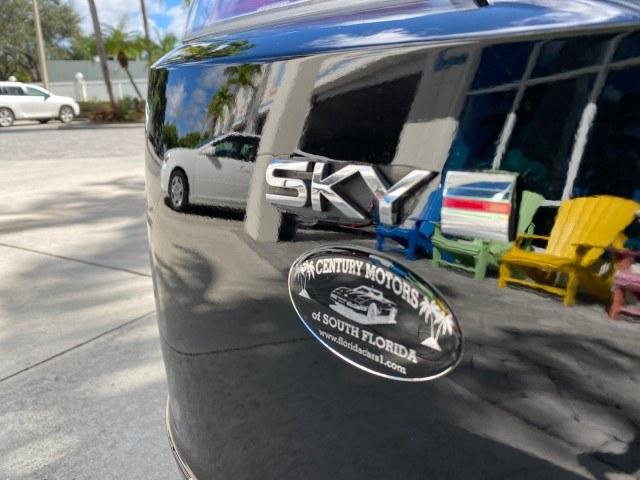 2009 Black Onyx /Black Saturn Sky Red Line TURBO LOW MILES 56,207 (1G8MT35X09Y) with an Turbocharged And Intercooled Ecotec 2.0L VVT DOHC 4-Cyl Aluminum Engine engine, Automatic transmission, located at 4701 North Dixie Hwy, Pompano Beach, FL, 33064, (954) 422-2889, 26.240938, -80.123474 - OUR WEBPAGE FLORIDACARS1.COM HAS OVER 100 PHOTOS AND FREE CARFAX LINK 2009 Saturn SKY Red Line Convertible 2.0L I4 F DOHC 16V Gasoline 31 MPG Rear Wheel Drive Features ABS Brakes Air Conditioning Alloy Wheels AM/FM Stereo Automatic Transmission CD Audio Leather Seats Cruise Control Power Locks Power- Photo#95