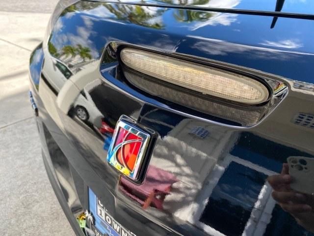 2009 Black Onyx /Black Saturn Sky Red Line TURBO LOW MILES 56,207 (1G8MT35X09Y) with an Turbocharged And Intercooled Ecotec 2.0L VVT DOHC 4-Cyl Aluminum Engine engine, Automatic transmission, located at 4701 North Dixie Hwy, Pompano Beach, FL, 33064, (954) 422-2889, 26.240938, -80.123474 - OUR WEBPAGE FLORIDACARS1.COM HAS OVER 100 PHOTOS AND FREE CARFAX LINK 2009 Saturn SKY Red Line Convertible 2.0L I4 F DOHC 16V Gasoline 31 MPG Rear Wheel Drive Features ABS Brakes Air Conditioning Alloy Wheels AM/FM Stereo Automatic Transmission CD Audio Leather Seats Cruise Control Power Locks Power- Photo#96