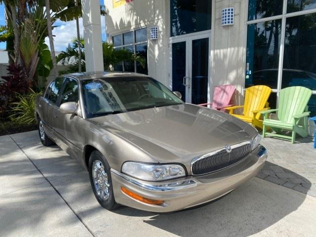 2000 Light Bronzemist Metallic /Taupe Buick Park Avenue Ultra LOW MILES 72,419 (1G4CU5416Y4) with an 3.8L SFI V6 3800 Series II Supercharged Engine engine, Automatic transmission, located at 4701 North Dixie Hwy, Pompano Beach, FL, 33064, (954) 422-2889, 26.240938, -80.123474 - OUR WEBPAGE FLORIDACARS1.COM HAS OVER 100 PHOTOS AND FREE CARFAX LINK 2000 Buick Park Avenue Ultra Sedan 4 DR 3.8L V6 F Gasoline 27 MPG Front Wheel Drive Features ABS Brakes Air Conditioning Alloy Wheels AM/FM Stereo Automatic Transmission Cassette Player CD Audio Cruise Control Front Seat Heaters L- Photo#1
