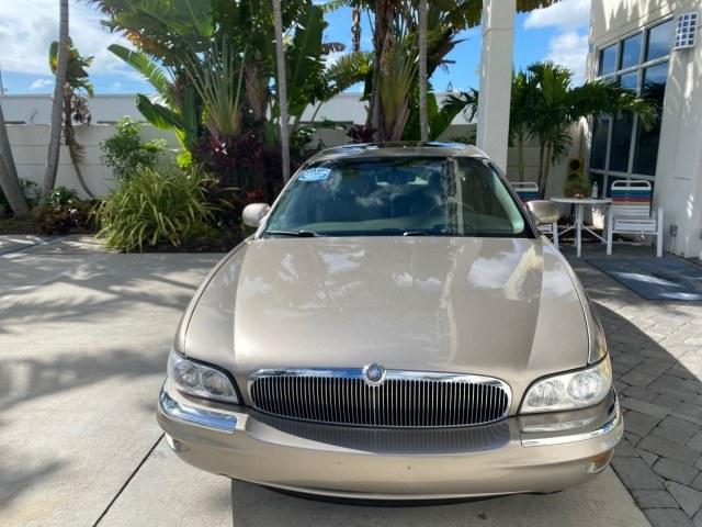 2000 Light Bronzemist Metallic /Taupe Buick Park Avenue Ultra LOW MILES 72,419 (1G4CU5416Y4) with an 3.8L SFI V6 3800 Series II Supercharged Engine engine, Automatic transmission, located at 4701 North Dixie Hwy, Pompano Beach, FL, 33064, (954) 422-2889, 26.240938, -80.123474 - OUR WEBPAGE FLORIDACARS1.COM HAS OVER 100 PHOTOS AND FREE CARFAX LINK 2000 Buick Park Avenue Ultra Sedan 4 DR 3.8L V6 F Gasoline 27 MPG Front Wheel Drive Features ABS Brakes Air Conditioning Alloy Wheels AM/FM Stereo Automatic Transmission Cassette Player CD Audio Cruise Control Front Seat Heaters L- Photo#2