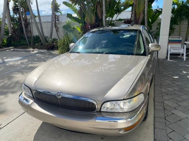 2000 Light Bronzemist Metallic /Taupe Buick Park Avenue Ultra LOW MILES 72,419 (1G4CU5416Y4) with an 3.8L SFI V6 3800 Series II Supercharged Engine engine, Automatic transmission, located at 4701 North Dixie Hwy, Pompano Beach, FL, 33064, (954) 422-2889, 26.240938, -80.123474 - OUR WEBPAGE FLORIDACARS1.COM HAS OVER 100 PHOTOS AND FREE CARFAX LINK 2000 Buick Park Avenue Ultra Sedan 4 DR 3.8L V6 F Gasoline 27 MPG Front Wheel Drive Features ABS Brakes Air Conditioning Alloy Wheels AM/FM Stereo Automatic Transmission Cassette Player CD Audio Cruise Control Front Seat Heaters L- Photo#3