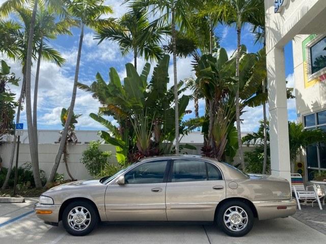 2000 Light Bronzemist Metallic /Taupe Buick Park Avenue Ultra LOW MILES 72,419 (1G4CU5416Y4) with an 3.8L SFI V6 3800 Series II Supercharged Engine engine, Automatic transmission, located at 4701 North Dixie Hwy, Pompano Beach, FL, 33064, (954) 422-2889, 26.240938, -80.123474 - OUR WEBPAGE FLORIDACARS1.COM HAS OVER 100 PHOTOS AND FREE CARFAX LINK 2000 Buick Park Avenue Ultra Sedan 4 DR 3.8L V6 F Gasoline 27 MPG Front Wheel Drive Features ABS Brakes Air Conditioning Alloy Wheels AM/FM Stereo Automatic Transmission Cassette Player CD Audio Cruise Control Front Seat Heaters L- Photo#4