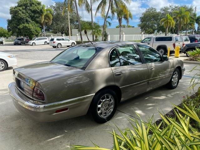 2000 Light Bronzemist Metallic /Taupe Buick Park Avenue Ultra LOW MILES 72,419 (1G4CU5416Y4) with an 3.8L SFI V6 3800 Series II Supercharged Engine engine, Automatic transmission, located at 4701 North Dixie Hwy, Pompano Beach, FL, 33064, (954) 422-2889, 26.240938, -80.123474 - OUR WEBPAGE FLORIDACARS1.COM HAS OVER 100 PHOTOS AND FREE CARFAX LINK 2000 Buick Park Avenue Ultra Sedan 4 DR 3.8L V6 F Gasoline 27 MPG Front Wheel Drive Features ABS Brakes Air Conditioning Alloy Wheels AM/FM Stereo Automatic Transmission Cassette Player CD Audio Cruise Control Front Seat Heaters L- Photo#7