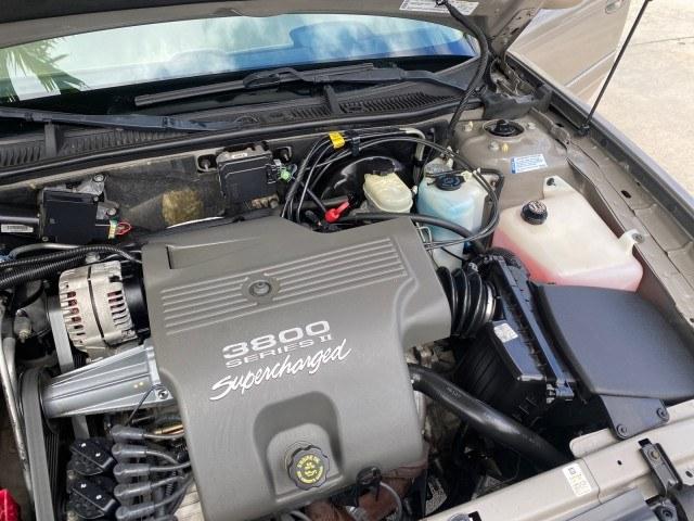 2000 Light Bronzemist Metallic /Taupe Buick Park Avenue Ultra LOW MILES 72,419 (1G4CU5416Y4) with an 3.8L SFI V6 3800 Series II Supercharged Engine engine, Automatic transmission, located at 4701 North Dixie Hwy, Pompano Beach, FL, 33064, (954) 422-2889, 26.240938, -80.123474 - OUR WEBPAGE FLORIDACARS1.COM HAS OVER 100 PHOTOS AND FREE CARFAX LINK 2000 Buick Park Avenue Ultra Sedan 4 DR 3.8L V6 F Gasoline 27 MPG Front Wheel Drive Features ABS Brakes Air Conditioning Alloy Wheels AM/FM Stereo Automatic Transmission Cassette Player CD Audio Cruise Control Front Seat Heaters L- Photo#25