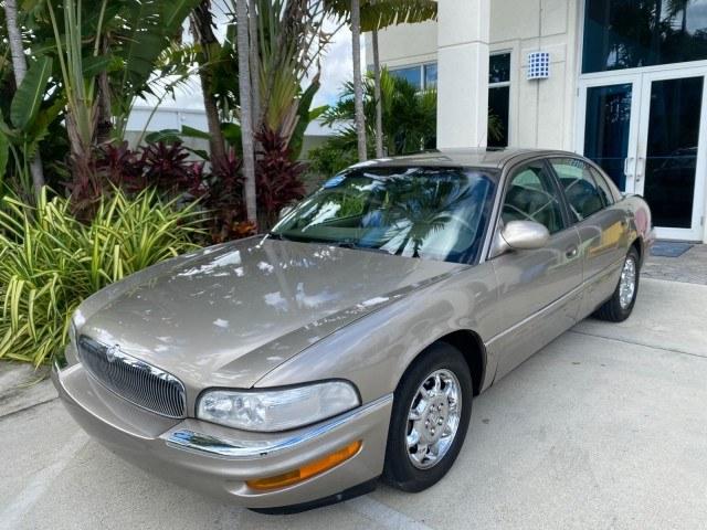 2000 Light Bronzemist Metallic /Taupe Buick Park Avenue Ultra LOW MILES 72,419 (1G4CU5416Y4) with an 3.8L SFI V6 3800 Series II Supercharged Engine engine, Automatic transmission, located at 4701 North Dixie Hwy, Pompano Beach, FL, 33064, (954) 422-2889, 26.240938, -80.123474 - OUR WEBPAGE FLORIDACARS1.COM HAS OVER 100 PHOTOS AND FREE CARFAX LINK 2000 Buick Park Avenue Ultra Sedan 4 DR 3.8L V6 F Gasoline 27 MPG Front Wheel Drive Features ABS Brakes Air Conditioning Alloy Wheels AM/FM Stereo Automatic Transmission Cassette Player CD Audio Cruise Control Front Seat Heaters L- Photo#29