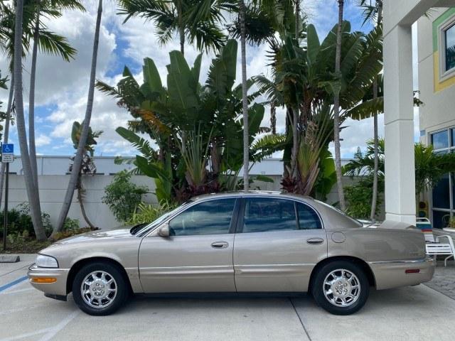 2000 Light Bronzemist Metallic /Taupe Buick Park Avenue Ultra LOW MILES 72,419 (1G4CU5416Y4) with an 3.8L SFI V6 3800 Series II Supercharged Engine engine, Automatic transmission, located at 4701 North Dixie Hwy, Pompano Beach, FL, 33064, (954) 422-2889, 26.240938, -80.123474 - OUR WEBPAGE FLORIDACARS1.COM HAS OVER 100 PHOTOS AND FREE CARFAX LINK 2000 Buick Park Avenue Ultra Sedan 4 DR 3.8L V6 F Gasoline 27 MPG Front Wheel Drive Features ABS Brakes Air Conditioning Alloy Wheels AM/FM Stereo Automatic Transmission Cassette Player CD Audio Cruise Control Front Seat Heaters L- Photo#30