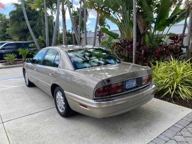 2000 Light Bronzemist Metallic /Taupe Buick Park Avenue Ultra LOW MILES 72,419 (1G4CU5416Y4) with an 3.8L SFI V6 3800 Series II Supercharged Engine engine, Automatic transmission, located at 4701 North Dixie Hwy, Pompano Beach, FL, 33064, (954) 422-2889, 26.240938, -80.123474 - OUR WEBPAGE FLORIDACARS1.COM HAS OVER 100 PHOTOS AND FREE CARFAX LINK 2000 Buick Park Avenue Ultra Sedan 4 DR 3.8L V6 F Gasoline 27 MPG Front Wheel Drive Features ABS Brakes Air Conditioning Alloy Wheels AM/FM Stereo Automatic Transmission Cassette Player CD Audio Cruise Control Front Seat Heaters L- Photo#32