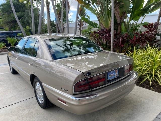 2000 Light Bronzemist Metallic /Taupe Buick Park Avenue Ultra LOW MILES 72,419 (1G4CU5416Y4) with an 3.8L SFI V6 3800 Series II Supercharged Engine engine, Automatic transmission, located at 4701 North Dixie Hwy, Pompano Beach, FL, 33064, (954) 422-2889, 26.240938, -80.123474 - OUR WEBPAGE FLORIDACARS1.COM HAS OVER 100 PHOTOS AND FREE CARFAX LINK 2000 Buick Park Avenue Ultra Sedan 4 DR 3.8L V6 F Gasoline 27 MPG Front Wheel Drive Features ABS Brakes Air Conditioning Alloy Wheels AM/FM Stereo Automatic Transmission Cassette Player CD Audio Cruise Control Front Seat Heaters L- Photo#33