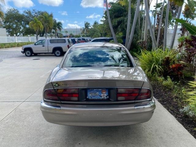 2000 Light Bronzemist Metallic /Taupe Buick Park Avenue Ultra LOW MILES 72,419 (1G4CU5416Y4) with an 3.8L SFI V6 3800 Series II Supercharged Engine engine, Automatic transmission, located at 4701 North Dixie Hwy, Pompano Beach, FL, 33064, (954) 422-2889, 26.240938, -80.123474 - OUR WEBPAGE FLORIDACARS1.COM HAS OVER 100 PHOTOS AND FREE CARFAX LINK 2000 Buick Park Avenue Ultra Sedan 4 DR 3.8L V6 F Gasoline 27 MPG Front Wheel Drive Features ABS Brakes Air Conditioning Alloy Wheels AM/FM Stereo Automatic Transmission Cassette Player CD Audio Cruise Control Front Seat Heaters L- Photo#34