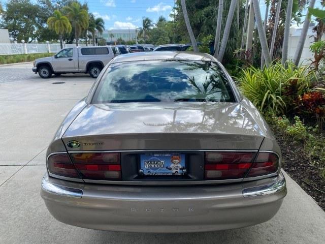 2000 Light Bronzemist Metallic /Taupe Buick Park Avenue Ultra LOW MILES 72,419 (1G4CU5416Y4) with an 3.8L SFI V6 3800 Series II Supercharged Engine engine, Automatic transmission, located at 4701 North Dixie Hwy, Pompano Beach, FL, 33064, (954) 422-2889, 26.240938, -80.123474 - OUR WEBPAGE FLORIDACARS1.COM HAS OVER 100 PHOTOS AND FREE CARFAX LINK 2000 Buick Park Avenue Ultra Sedan 4 DR 3.8L V6 F Gasoline 27 MPG Front Wheel Drive Features ABS Brakes Air Conditioning Alloy Wheels AM/FM Stereo Automatic Transmission Cassette Player CD Audio Cruise Control Front Seat Heaters L- Photo#35
