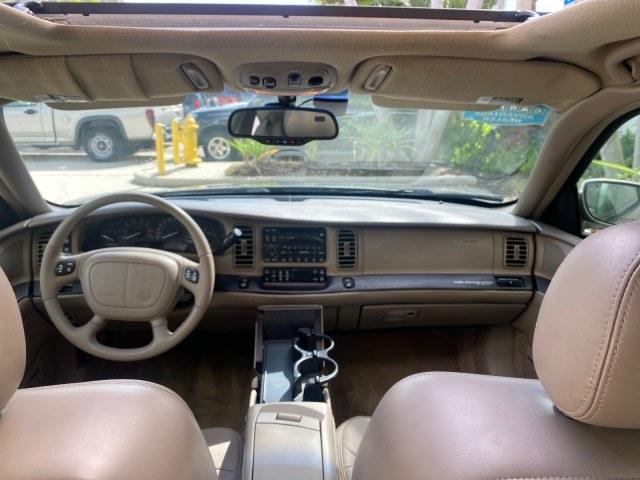 2000 Light Bronzemist Metallic /Taupe Buick Park Avenue Ultra LOW MILES 72,419 (1G4CU5416Y4) with an 3.8L SFI V6 3800 Series II Supercharged Engine engine, Automatic transmission, located at 4701 North Dixie Hwy, Pompano Beach, FL, 33064, (954) 422-2889, 26.240938, -80.123474 - OUR WEBPAGE FLORIDACARS1.COM HAS OVER 100 PHOTOS AND FREE CARFAX LINK 2000 Buick Park Avenue Ultra Sedan 4 DR 3.8L V6 F Gasoline 27 MPG Front Wheel Drive Features ABS Brakes Air Conditioning Alloy Wheels AM/FM Stereo Automatic Transmission Cassette Player CD Audio Cruise Control Front Seat Heaters L- Photo#89