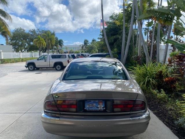 2000 Light Bronzemist Metallic /Taupe Buick Park Avenue Ultra LOW MILES 72,419 (1G4CU5416Y4) with an 3.8L SFI V6 3800 Series II Supercharged Engine engine, Automatic transmission, located at 4701 North Dixie Hwy, Pompano Beach, FL, 33064, (954) 422-2889, 26.240938, -80.123474 - OUR WEBPAGE FLORIDACARS1.COM HAS OVER 100 PHOTOS AND FREE CARFAX LINK 2000 Buick Park Avenue Ultra Sedan 4 DR 3.8L V6 F Gasoline 27 MPG Front Wheel Drive Features ABS Brakes Air Conditioning Alloy Wheels AM/FM Stereo Automatic Transmission Cassette Player CD Audio Cruise Control Front Seat Heaters L- Photo#98