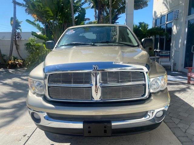 2004 Light Almond Pearl Metallic /Taupe Dodge Ram 1500 SLT CREW CAB 45,173 1 OWNER (1D7HA18N74S) with an 4.7L V8 Magnum Engine engine, Automatic transmission, located at 4701 North Dixie Hwy, Pompano Beach, FL, 33064, (954) 422-2889, 26.240938, -80.123474 - OUR WEBPAGE FLORIDACARS1.COM HAS OVER 100 PHOTOS AND FREE CARFAX LINK 2004 Dodge Ram 1500 ST 1 OWNER 4 Door Extended Cab Pickup 4.7L V8 F Gasoline 19 MPG Rear Wheel Drive Features ABS Brakes Air Conditioning AM/FM Stereo Automatic Transmission Bed Cover Bed Liner Cassette Player CD Audio Cruise Cont- Photo#2