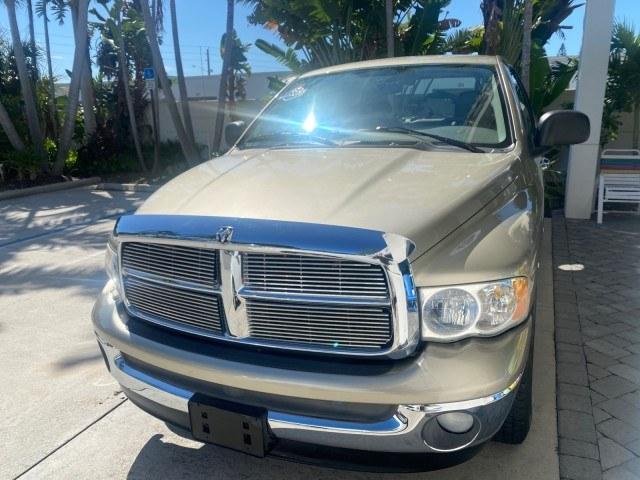 2004 Light Almond Pearl Metallic /Taupe Dodge Ram 1500 SLT CREW CAB 45,173 1 OWNER (1D7HA18N74S) with an 4.7L V8 Magnum Engine engine, Automatic transmission, located at 4701 North Dixie Hwy, Pompano Beach, FL, 33064, (954) 422-2889, 26.240938, -80.123474 - OUR WEBPAGE FLORIDACARS1.COM HAS OVER 100 PHOTOS AND FREE CARFAX LINK 2004 Dodge Ram 1500 ST 1 OWNER 4 Door Extended Cab Pickup 4.7L V8 F Gasoline 19 MPG Rear Wheel Drive Features ABS Brakes Air Conditioning AM/FM Stereo Automatic Transmission Bed Cover Bed Liner Cassette Player CD Audio Cruise Cont- Photo#3