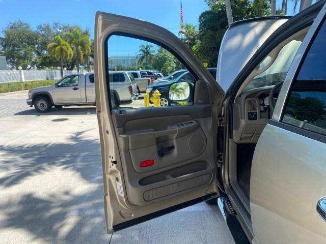 2004 Light Almond Pearl Metallic /Taupe Dodge Ram 1500 SLT CREW CAB 45,173 1 OWNER (1D7HA18N74S) with an 4.7L V8 Magnum Engine engine, Automatic transmission, located at 4701 North Dixie Hwy, Pompano Beach, FL, 33064, (954) 422-2889, 26.240938, -80.123474 - OUR WEBPAGE FLORIDACARS1.COM HAS OVER 100 PHOTOS AND FREE CARFAX LINK 2004 Dodge Ram 1500 ST 1 OWNER 4 Door Extended Cab Pickup 4.7L V8 F Gasoline 19 MPG Rear Wheel Drive Features ABS Brakes Air Conditioning AM/FM Stereo Automatic Transmission Bed Cover Bed Liner Cassette Player CD Audio Cruise Cont- Photo#9