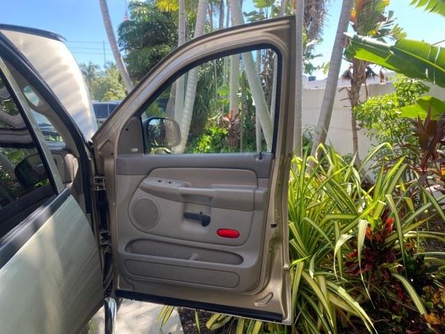 2004 Light Almond Pearl Metallic /Taupe Dodge Ram 1500 SLT CREW CAB 45,173 1 OWNER (1D7HA18N74S) with an 4.7L V8 Magnum Engine engine, Automatic transmission, located at 4701 North Dixie Hwy, Pompano Beach, FL, 33064, (954) 422-2889, 26.240938, -80.123474 - OUR WEBPAGE FLORIDACARS1.COM HAS OVER 100 PHOTOS AND FREE CARFAX LINK 2004 Dodge Ram 1500 ST 1 OWNER 4 Door Extended Cab Pickup 4.7L V8 F Gasoline 19 MPG Rear Wheel Drive Features ABS Brakes Air Conditioning AM/FM Stereo Automatic Transmission Bed Cover Bed Liner Cassette Player CD Audio Cruise Cont- Photo#11
