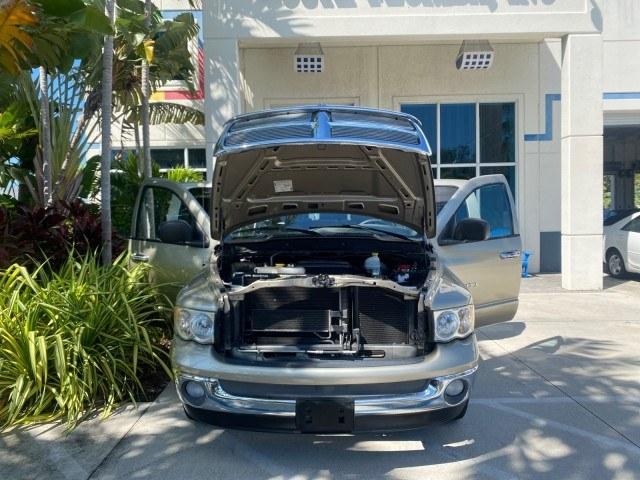 2004 Light Almond Pearl Metallic /Taupe Dodge Ram 1500 SLT CREW CAB 45,173 1 OWNER (1D7HA18N74S) with an 4.7L V8 Magnum Engine engine, Automatic transmission, located at 4701 North Dixie Hwy, Pompano Beach, FL, 33064, (954) 422-2889, 26.240938, -80.123474 - OUR WEBPAGE FLORIDACARS1.COM HAS OVER 100 PHOTOS AND FREE CARFAX LINK 2004 Dodge Ram 1500 ST 1 OWNER 4 Door Extended Cab Pickup 4.7L V8 F Gasoline 19 MPG Rear Wheel Drive Features ABS Brakes Air Conditioning AM/FM Stereo Automatic Transmission Bed Cover Bed Liner Cassette Player CD Audio Cruise Cont- Photo#16