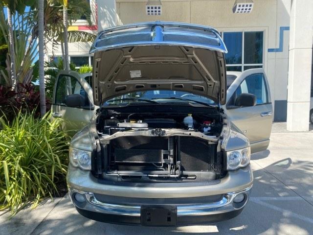 2004 Light Almond Pearl Metallic /Taupe Dodge Ram 1500 SLT CREW CAB 45,173 1 OWNER (1D7HA18N74S) with an 4.7L V8 Magnum Engine engine, Automatic transmission, located at 4701 North Dixie Hwy, Pompano Beach, FL, 33064, (954) 422-2889, 26.240938, -80.123474 - OUR WEBPAGE FLORIDACARS1.COM HAS OVER 100 PHOTOS AND FREE CARFAX LINK 2004 Dodge Ram 1500 ST 1 OWNER 4 Door Extended Cab Pickup 4.7L V8 F Gasoline 19 MPG Rear Wheel Drive Features ABS Brakes Air Conditioning AM/FM Stereo Automatic Transmission Bed Cover Bed Liner Cassette Player CD Audio Cruise Cont- Photo#17
