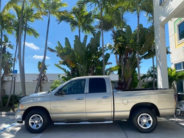 2004 Light Almond Pearl Metallic /Taupe Dodge Ram 1500 SLT CREW CAB 45,173 1 OWNER (1D7HA18N74S) with an 4.7L V8 Magnum Engine engine, Automatic transmission, located at 4701 North Dixie Hwy, Pompano Beach, FL, 33064, (954) 422-2889, 26.240938, -80.123474 - OUR WEBPAGE FLORIDACARS1.COM HAS OVER 100 PHOTOS AND FREE CARFAX LINK 2004 Dodge Ram 1500 ST 1 OWNER 4 Door Extended Cab Pickup 4.7L V8 F Gasoline 19 MPG Rear Wheel Drive Features ABS Brakes Air Conditioning AM/FM Stereo Automatic Transmission Bed Cover Bed Liner Cassette Player CD Audio Cruise Cont- Photo#30