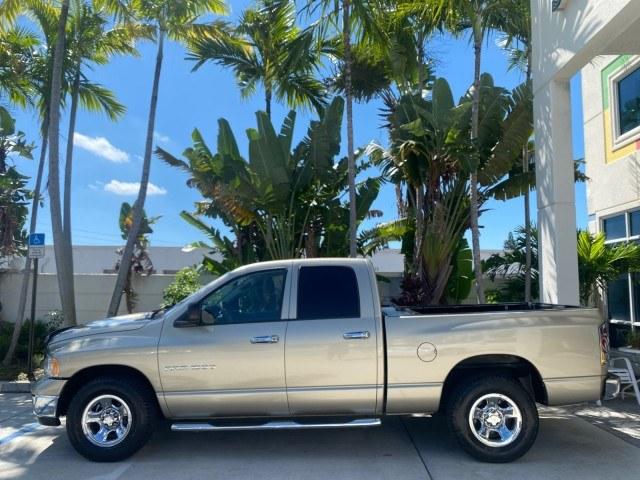 2004 Light Almond Pearl Metallic /Taupe Dodge Ram 1500 SLT CREW CAB 45,173 1 OWNER (1D7HA18N74S) with an 4.7L V8 Magnum Engine engine, Automatic transmission, located at 4701 North Dixie Hwy, Pompano Beach, FL, 33064, (954) 422-2889, 26.240938, -80.123474 - OUR WEBPAGE FLORIDACARS1.COM HAS OVER 100 PHOTOS AND FREE CARFAX LINK 2004 Dodge Ram 1500 ST 1 OWNER 4 Door Extended Cab Pickup 4.7L V8 F Gasoline 19 MPG Rear Wheel Drive Features ABS Brakes Air Conditioning AM/FM Stereo Automatic Transmission Bed Cover Bed Liner Cassette Player CD Audio Cruise Cont- Photo#31
