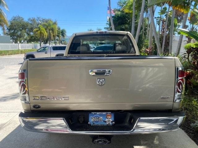 2004 Light Almond Pearl Metallic /Taupe Dodge Ram 1500 SLT CREW CAB 45,173 1 OWNER (1D7HA18N74S) with an 4.7L V8 Magnum Engine engine, Automatic transmission, located at 4701 North Dixie Hwy, Pompano Beach, FL, 33064, (954) 422-2889, 26.240938, -80.123474 - OUR WEBPAGE FLORIDACARS1.COM HAS OVER 100 PHOTOS AND FREE CARFAX LINK 2004 Dodge Ram 1500 ST 1 OWNER 4 Door Extended Cab Pickup 4.7L V8 F Gasoline 19 MPG Rear Wheel Drive Features ABS Brakes Air Conditioning AM/FM Stereo Automatic Transmission Bed Cover Bed Liner Cassette Player CD Audio Cruise Cont- Photo#35
