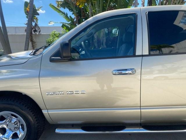 2004 Light Almond Pearl Metallic /Taupe Dodge Ram 1500 SLT CREW CAB 45,173 1 OWNER (1D7HA18N74S) with an 4.7L V8 Magnum Engine engine, Automatic transmission, located at 4701 North Dixie Hwy, Pompano Beach, FL, 33064, (954) 422-2889, 26.240938, -80.123474 - OUR WEBPAGE FLORIDACARS1.COM HAS OVER 100 PHOTOS AND FREE CARFAX LINK 2004 Dodge Ram 1500 ST 1 OWNER 4 Door Extended Cab Pickup 4.7L V8 F Gasoline 19 MPG Rear Wheel Drive Features ABS Brakes Air Conditioning AM/FM Stereo Automatic Transmission Bed Cover Bed Liner Cassette Player CD Audio Cruise Cont- Photo#37