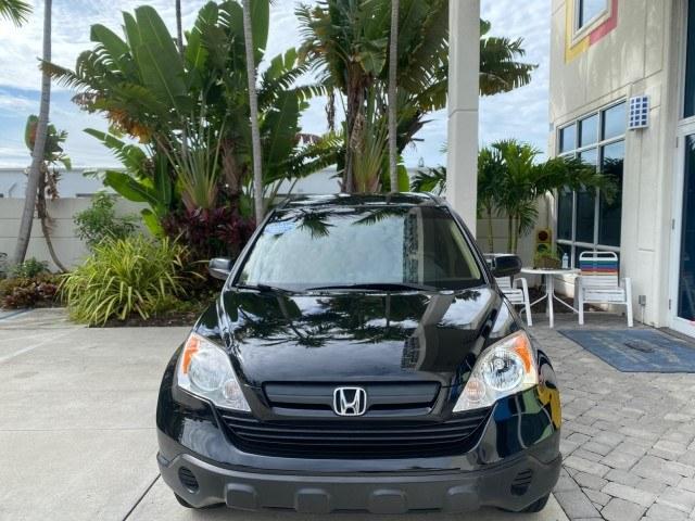 2007 Nighthawk Black Pearl /Ivory Honda CR-V LX LOW MILES 74,639 (JHLRE38377C) with an 2.4L 4-Cyl Engine engine, Automatic transmission, located at 4701 North Dixie Hwy, Pompano Beach, FL, 33064, (954) 422-2889, 26.240938, -80.123474 - OUR WEBPAGE FLORIDACARS1.COM HAS OVER 100 PHOTOS AND FREE CARFAX LINK 2007 Honda CR-V LX 4 Door Wagon/Sport Utility 2.4L I4 F DOHC 16V Gasoline 30 MPG Front Wheel Drive Features ABS Brakes Air Conditioning AM/FM Stereo Automatic Transmission Auxiliary Audio Input CD Audio Cloth Seats Cruise Control- Photo#2