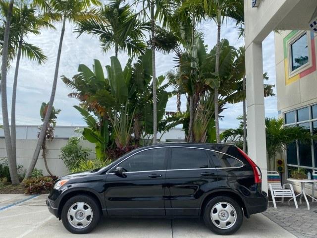 2007 Nighthawk Black Pearl /Ivory Honda CR-V LX LOW MILES 74,639 (JHLRE38377C) with an 2.4L 4-Cyl Engine engine, Automatic transmission, located at 4701 North Dixie Hwy, Pompano Beach, FL, 33064, (954) 422-2889, 26.240938, -80.123474 - OUR WEBPAGE FLORIDACARS1.COM HAS OVER 100 PHOTOS AND FREE CARFAX LINK 2007 Honda CR-V LX 4 Door Wagon/Sport Utility 2.4L I4 F DOHC 16V Gasoline 30 MPG Front Wheel Drive Features ABS Brakes Air Conditioning AM/FM Stereo Automatic Transmission Auxiliary Audio Input CD Audio Cloth Seats Cruise Control- Photo#4