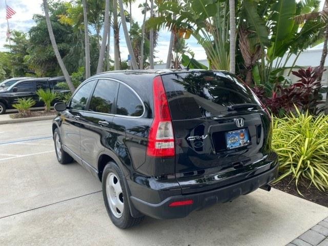 2007 Nighthawk Black Pearl /Ivory Honda CR-V LX LOW MILES 74,639 (JHLRE38377C) with an 2.4L 4-Cyl Engine engine, Automatic transmission, located at 4701 North Dixie Hwy, Pompano Beach, FL, 33064, (954) 422-2889, 26.240938, -80.123474 - OUR WEBPAGE FLORIDACARS1.COM HAS OVER 100 PHOTOS AND FREE CARFAX LINK 2007 Honda CR-V LX 4 Door Wagon/Sport Utility 2.4L I4 F DOHC 16V Gasoline 30 MPG Front Wheel Drive Features ABS Brakes Air Conditioning AM/FM Stereo Automatic Transmission Auxiliary Audio Input CD Audio Cloth Seats Cruise Control- Photo#5